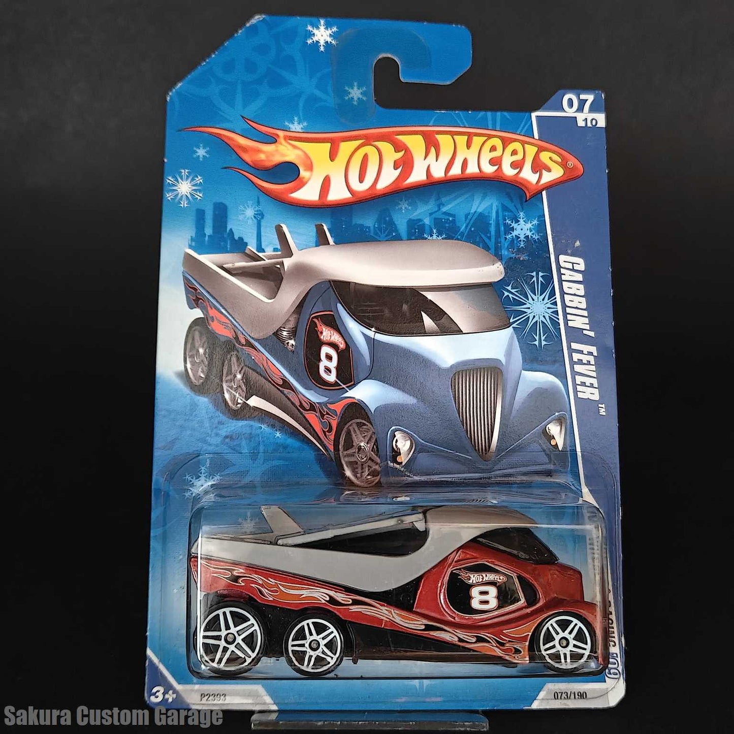 Hot Wheels - Cabbin' Fever (2009) 07/10 HW Racing  73/190 (Target US Exclusive snowflake card)