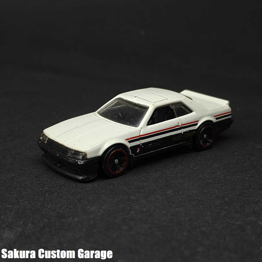 Hot Wheels - Nissan Skyline RS KDR30 (2019) 1/10 Nightburnerz 048/250